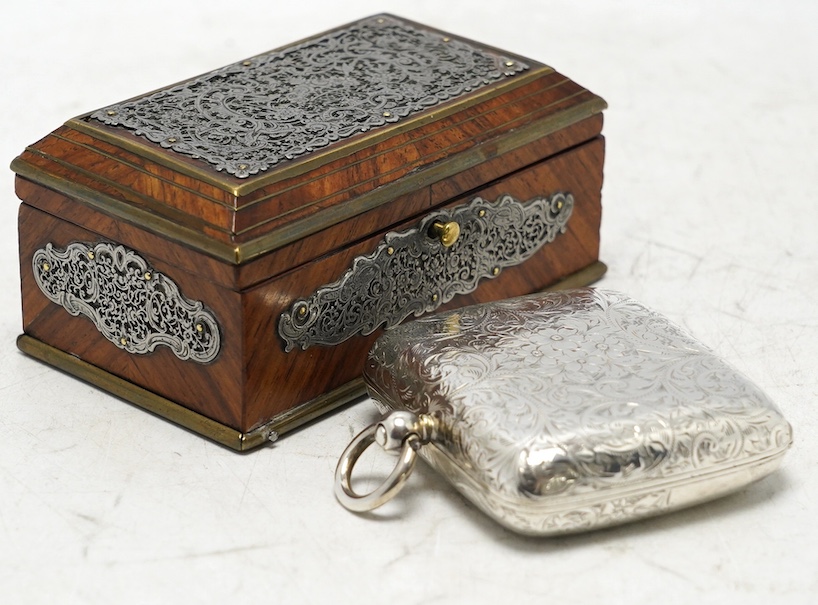 An Edwardian engraved silver combination sovereign/half sovereign and stamp case, E.J. Trevitt & Sons, Chester, 1901, 57mm and a white metal mounted kingwood snuff box. Condition - fair to good